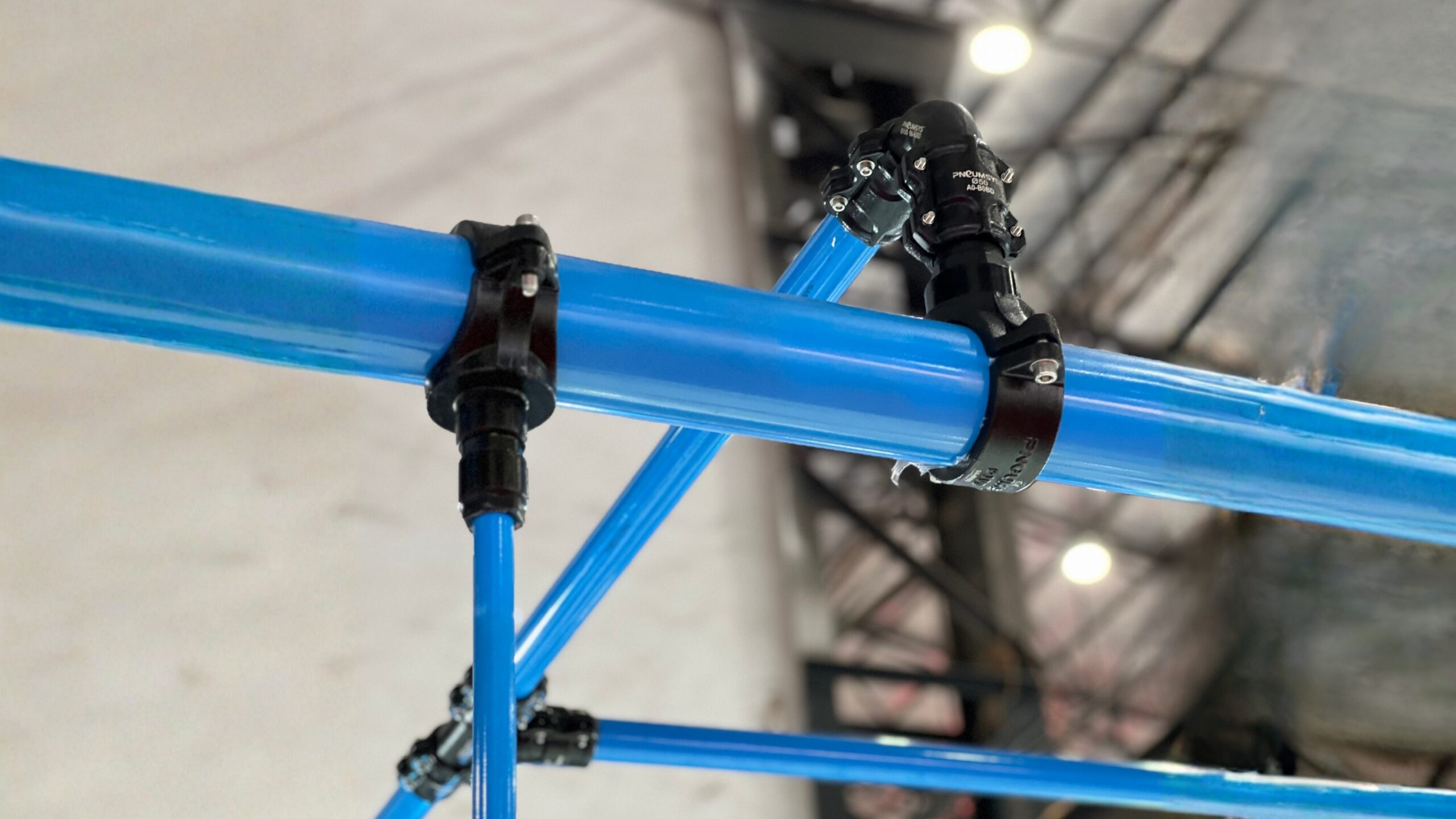 Push-fit aluminium pipe fittings in a modern aluminum compressed air piping system installed in Mumbai by Luthra Pneumsys